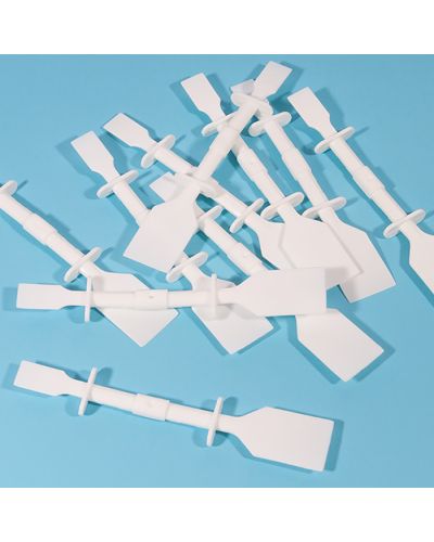 Double ended paste spreaders