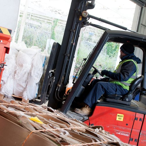 Person operating a forklift
